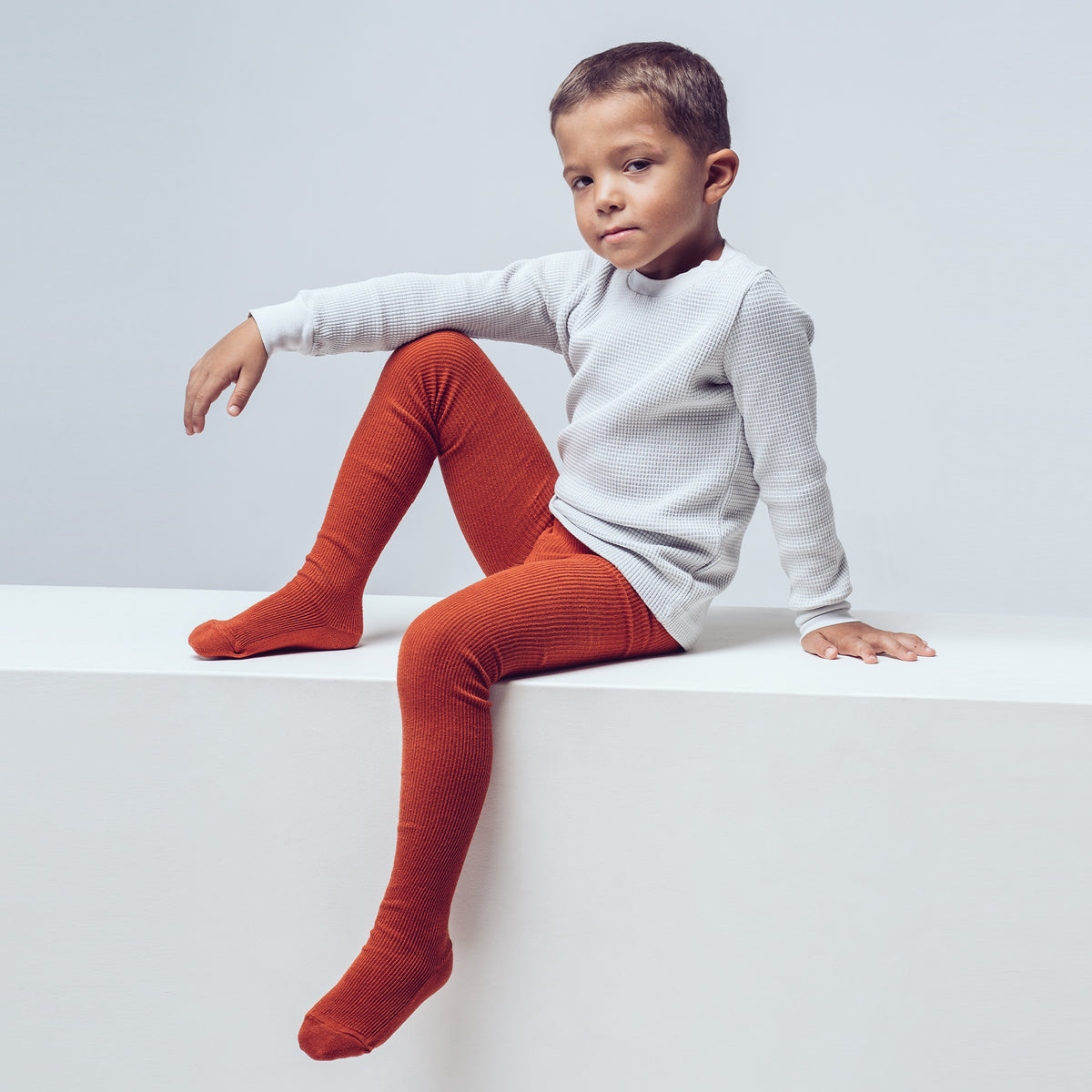 PEQNE Footed Children Tights in Rusty Red