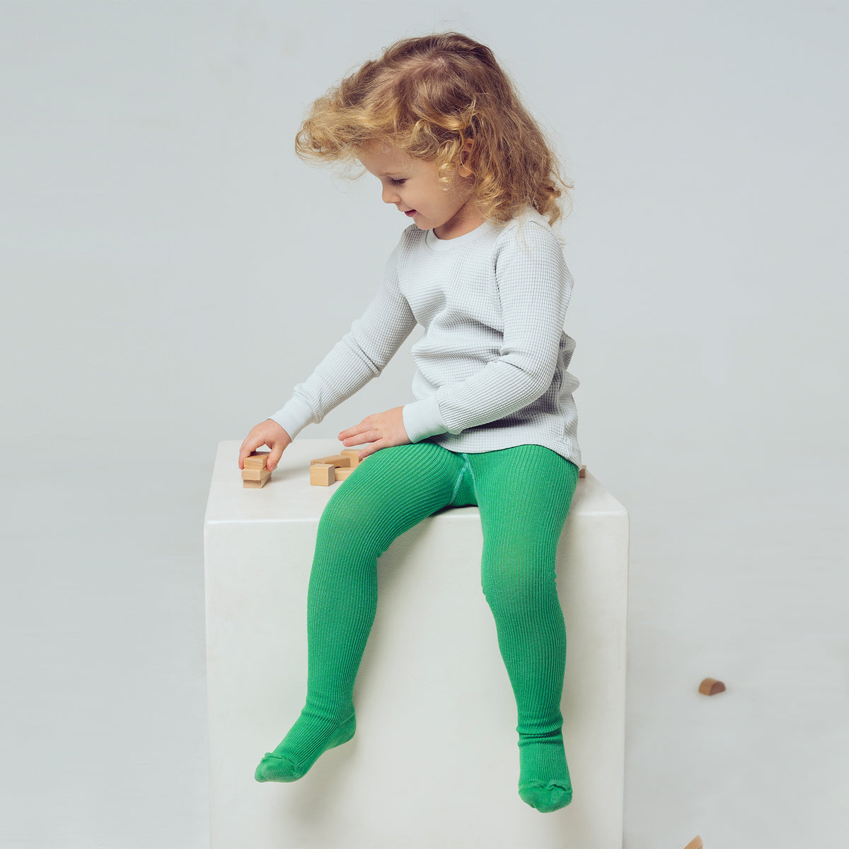 PEQNE Footed Children Tights in Spring Green